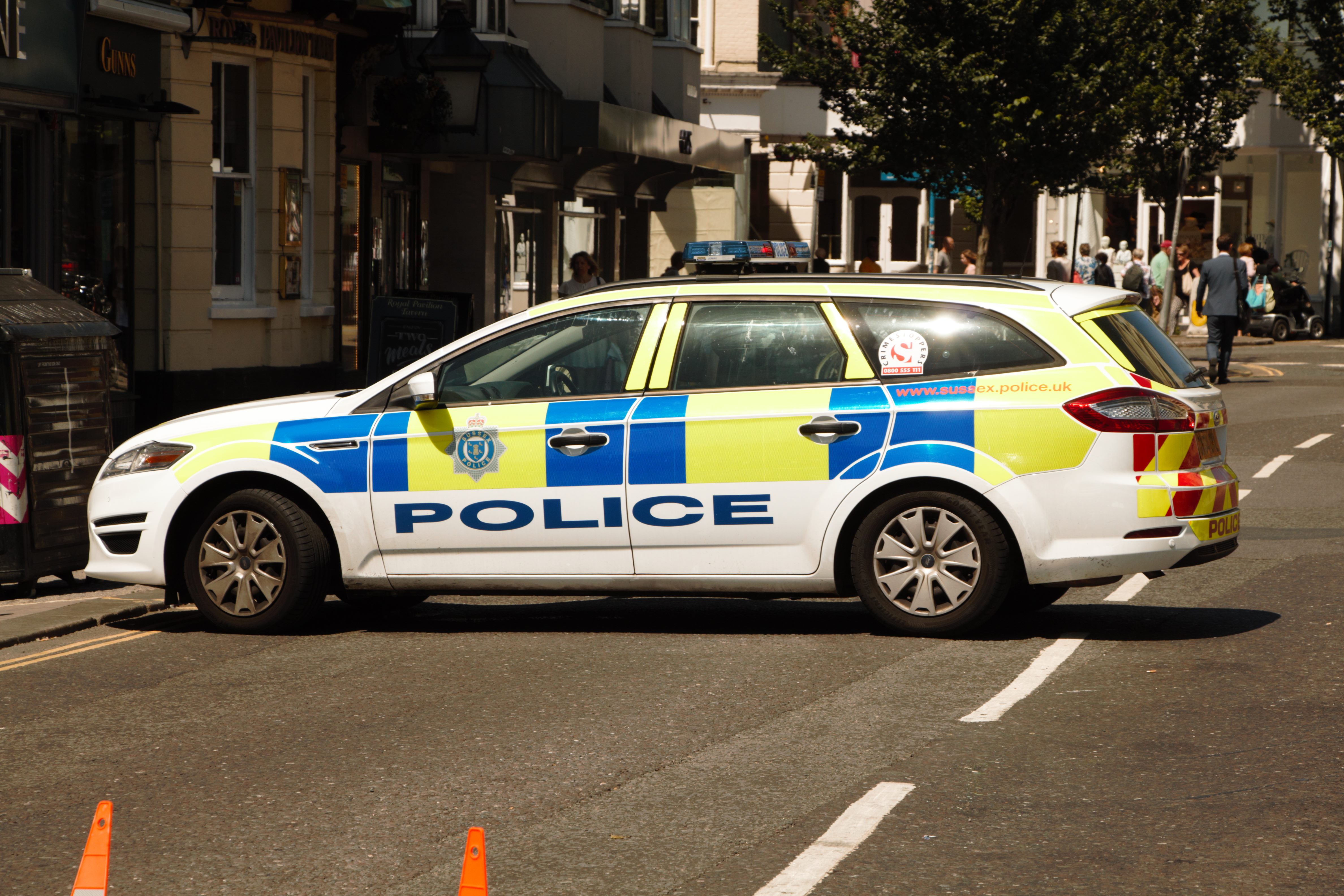 RAC Insurance Fails to Impress image of a police car positioned across a busy road